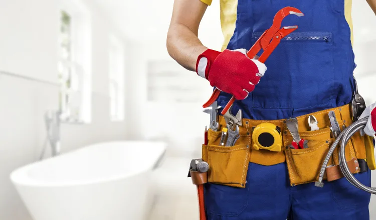 The torso of plumbing technician showing a tool belt from Plumbing Lake Travis in Austin, TX - Commercial plumbing services