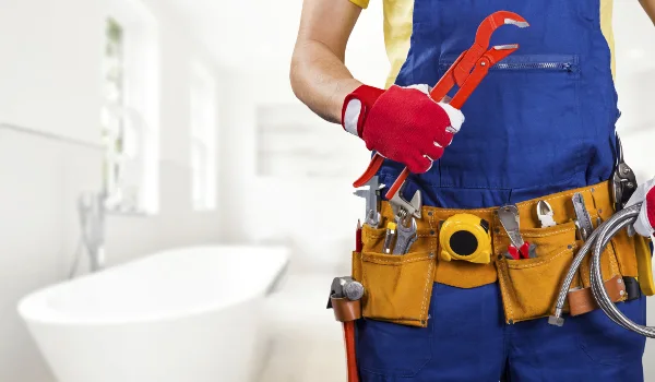 The torso of plumbing technician showing a tool belt from Plumbing Lake Travis in Austin, TX - Septic System Maintenance & Repair